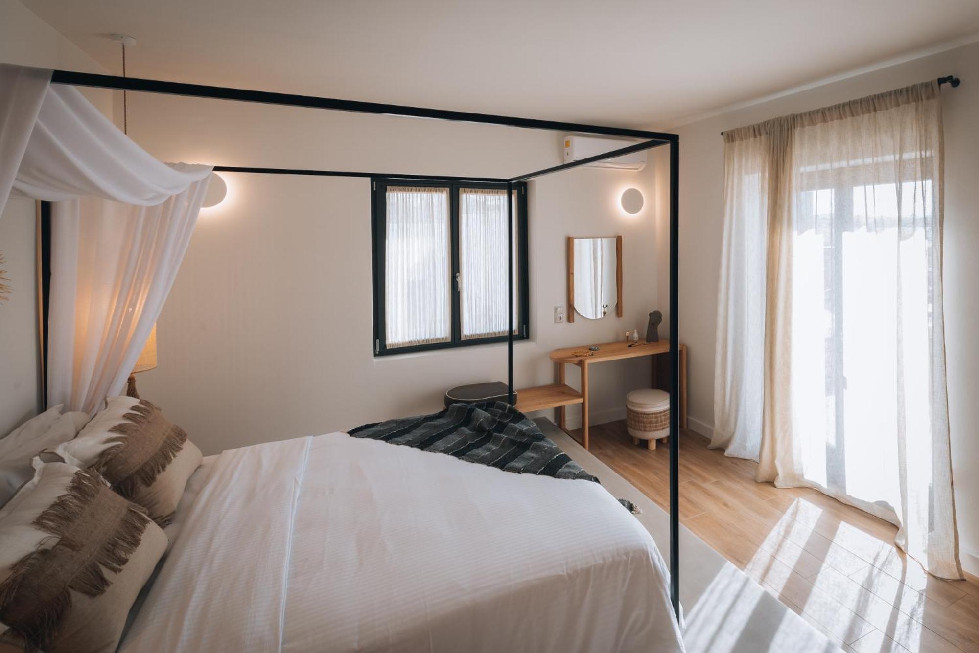 Kosmitis Suites & Villas Náousa Rum bild